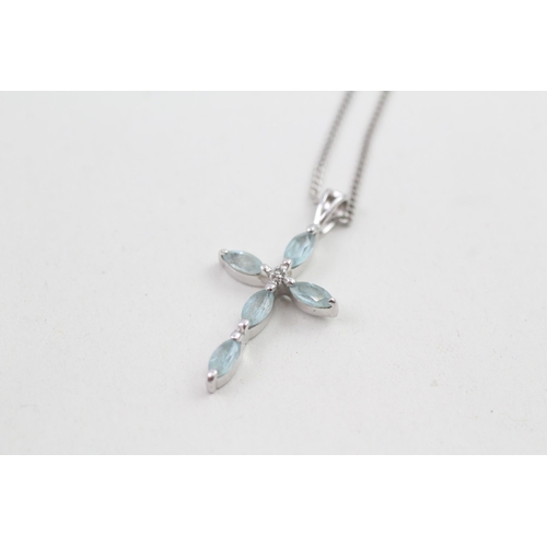 64 - 9ct white gold diamond & topaz cross pendant necklace 2.6g