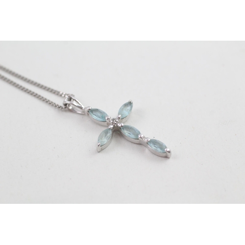 64 - 9ct white gold diamond & topaz cross pendant necklace 2.6g