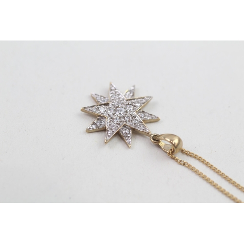 65 - 9ct gold cubic zirconia starburst pendant necklace 2.7g