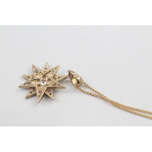 65 - 9ct gold cubic zirconia starburst pendant necklace 2.7g