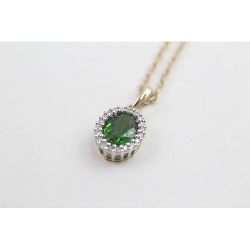 69 - 9ct gold diamond & chrome diopside oval halo pendant necklace 2.8g