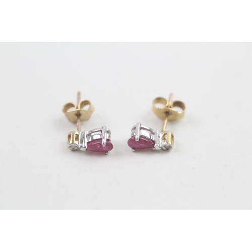 87 - 9ct gold diamond & pear shaped ruby dangle earrings 1g