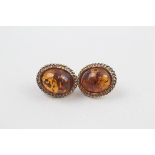 88 - 9ct gold Baltic amber oval cabochon stud earrings 2g