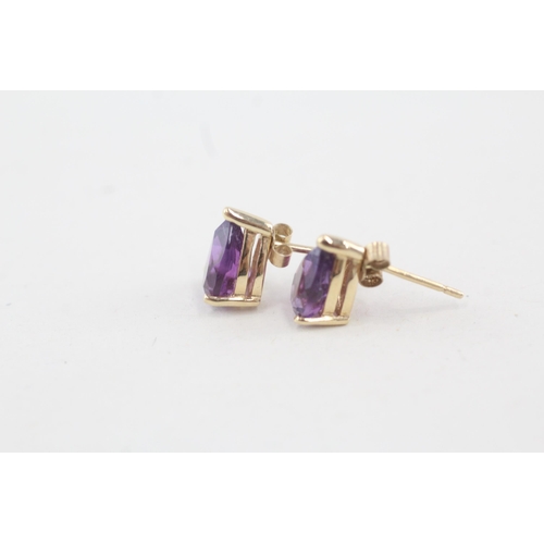 9 - 14ct gold pear shape amethyst single stone stud earrings with 9ct backs 1.7g