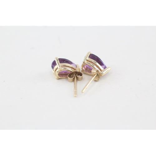 9 - 14ct gold pear shape amethyst single stone stud earrings with 9ct backs 1.7g