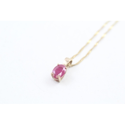 1 - 9ct gold ruby solitaire pendant with 9ct gold chain 1.6g