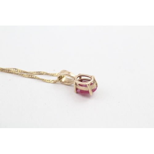 1 - 9ct gold ruby solitaire pendant with 9ct gold chain 1.6g