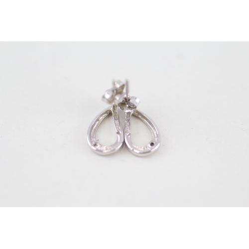 120 - 9ct white gold diamond stud earrings 1.3g