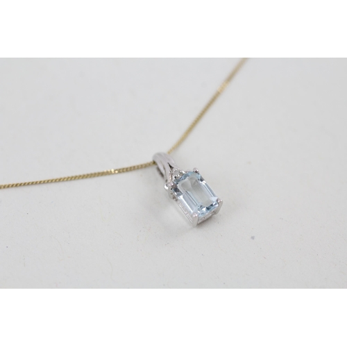 13 - 9ct white gold aquamarine and diamond pendant with 9ct gold chain 0.9g