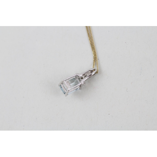 13 - 9ct white gold aquamarine and diamond pendant with 9ct gold chain 0.9g