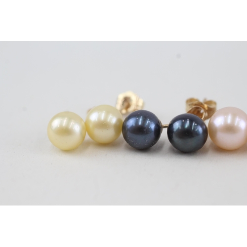 130 - 4x 14ct gold vari-hue cultured pearl stud earrings with scroll backs 6.1g