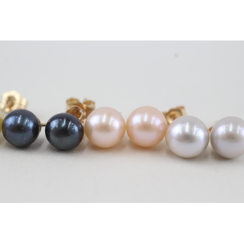 130 - 4x 14ct gold vari-hue cultured pearl stud earrings with scroll backs 6.1g