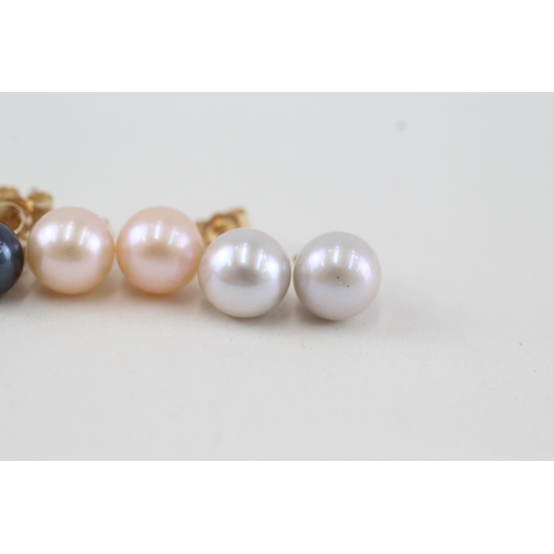 130 - 4x 14ct gold vari-hue cultured pearl stud earrings with scroll backs 6.1g