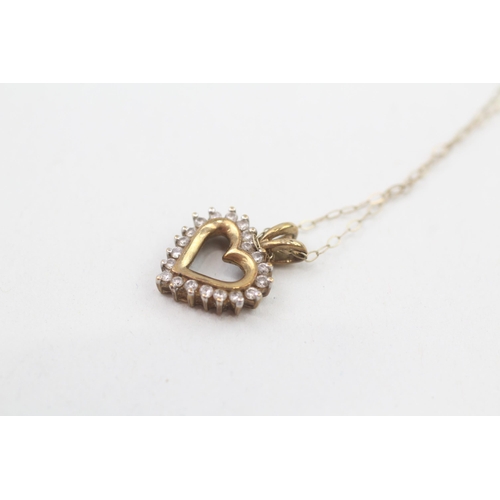 142 - 9ct gold diamond heart pendant with 9ct gold chain 1.8g