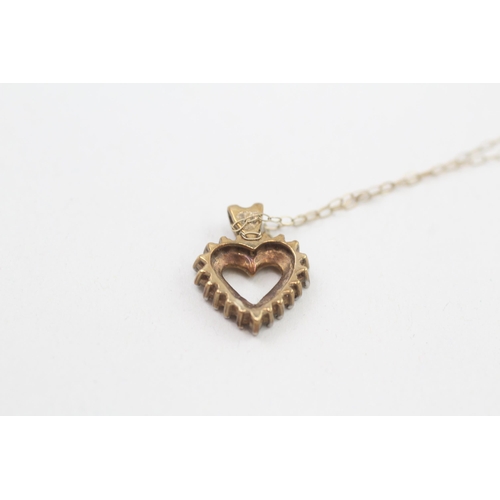 142 - 9ct gold diamond heart pendant with 9ct gold chain 1.8g