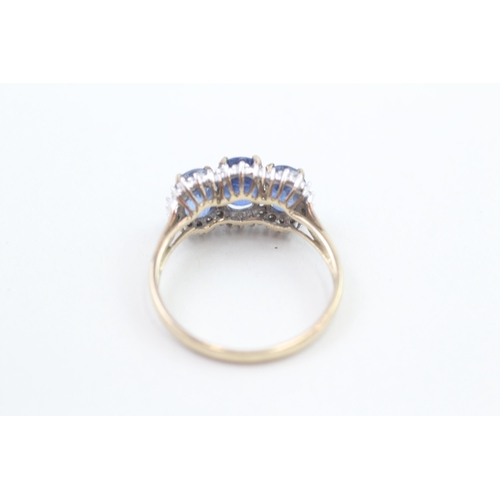 151 - 9ct gold kyanite and diamond halo trilogy cocktail ring 3.2g   Size P