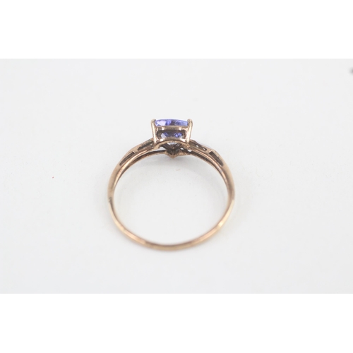 164 - 9ct gold tanzanite and diamond shoulder set dress ring 1.1g   Size O