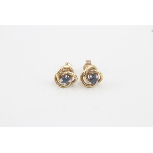 25 - 9ct gold sapphire knot stud earrings 1.4g