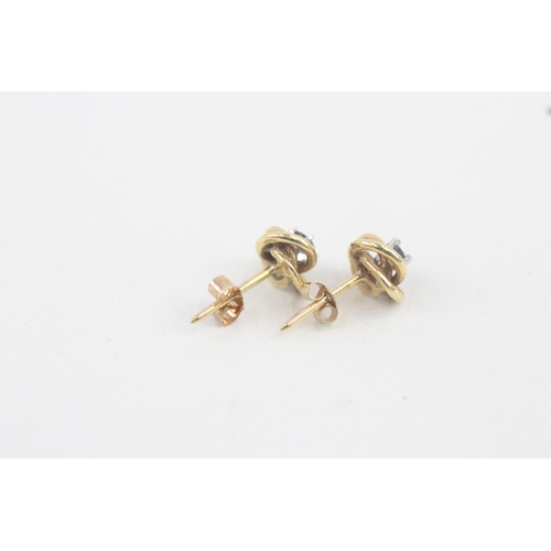 25 - 9ct gold sapphire knot stud earrings 1.4g