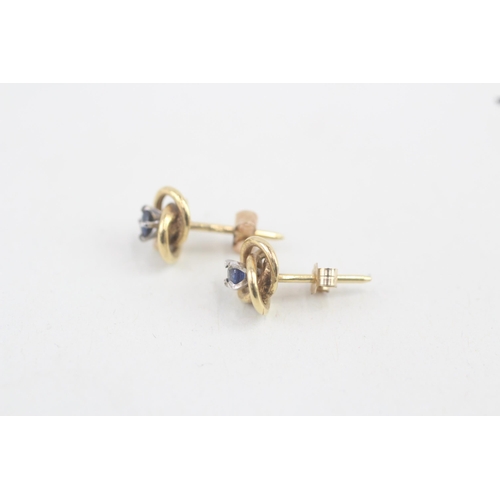 25 - 9ct gold sapphire knot stud earrings 1.4g