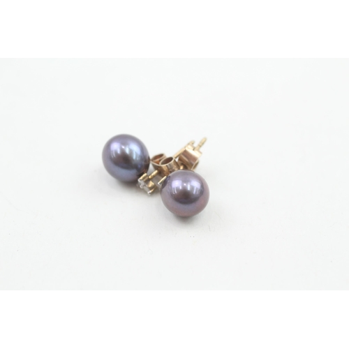 26 - 9ct gold cultured pearl and diamond stud earrings 2.1g