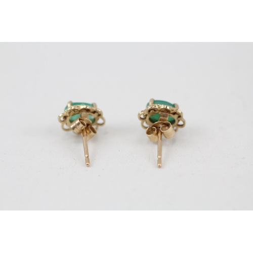 31 - 9ct gold emerald solitaire stud earrings 1g