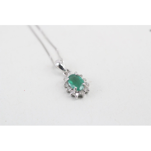 41 - 9ct white gold emerald and diamond halo pendant with 9ct white gold chain 1.3g