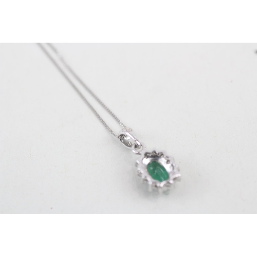 41 - 9ct white gold emerald and diamond halo pendant with 9ct white gold chain 1.3g