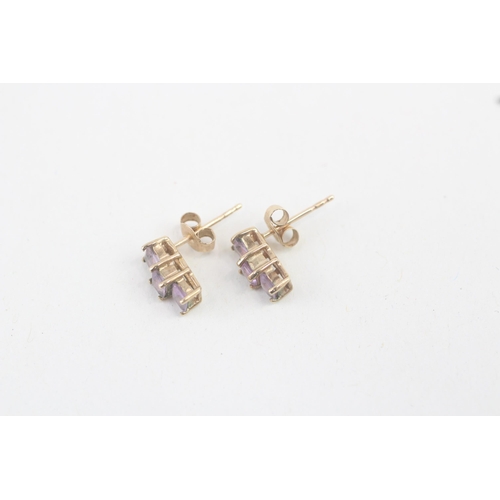 44 - 9ct gold amethyst trilogy stud earrings 1.2g