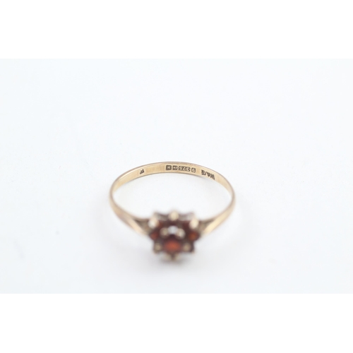 47 - 9ct gold garnet floral cluster dress ring 1.2g   Size N