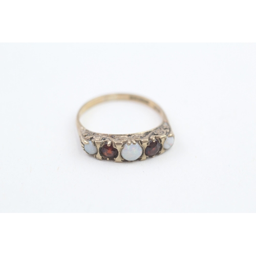 49 - 9ct gold vintage garnet and opal gypsy dress ring 2.5g   Size N