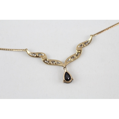 56 - 9ct gold sapphire and cubic zirconia pendant with 9ct gold chain 3.2g