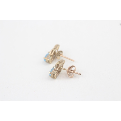 61 - 9ct gold blue topaz and diamond stud earrings 1.2g