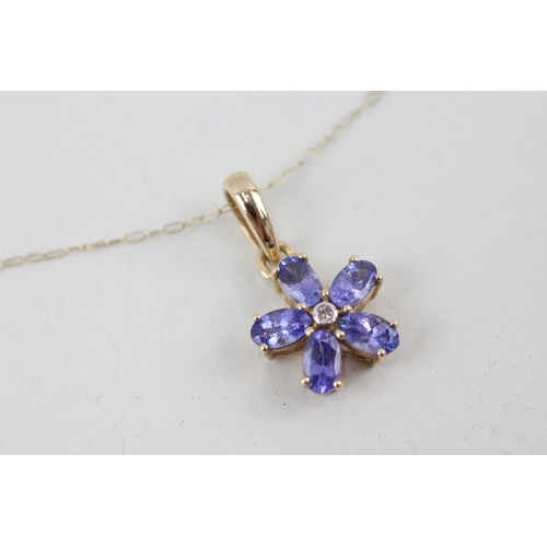 63 - 9ct gold tanzanite and diamond floral pendant with 9ct gold chain 1.8g