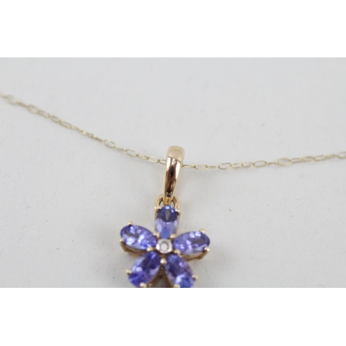 63 - 9ct gold tanzanite and diamond floral pendant with 9ct gold chain 1.8g