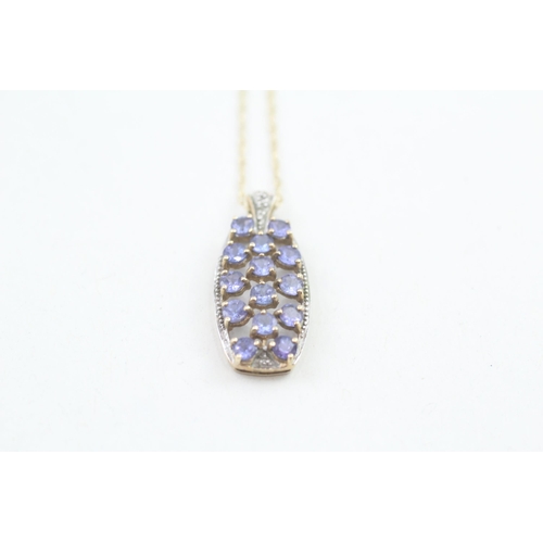 8 - 9ct gold tanzanite and diamond pendant with 9ct gold chain 2.4g