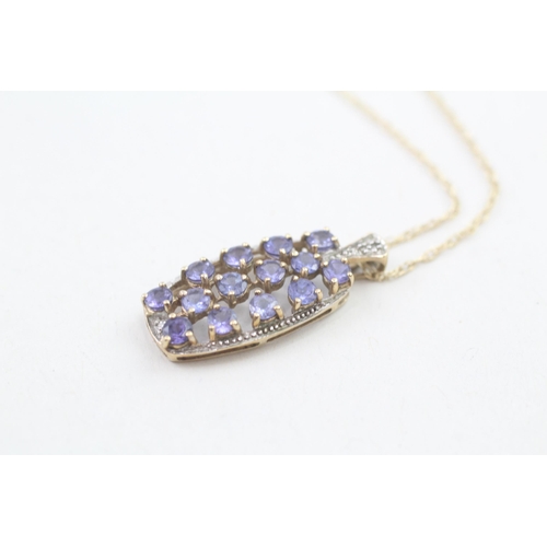 8 - 9ct gold tanzanite and diamond pendant with 9ct gold chain 2.4g