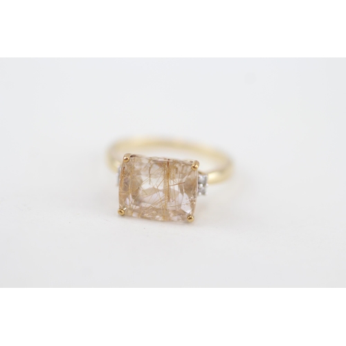 97 - 9ct gold rutilated quartz and diamond cocktail ring 2.9g   Size N 1/2