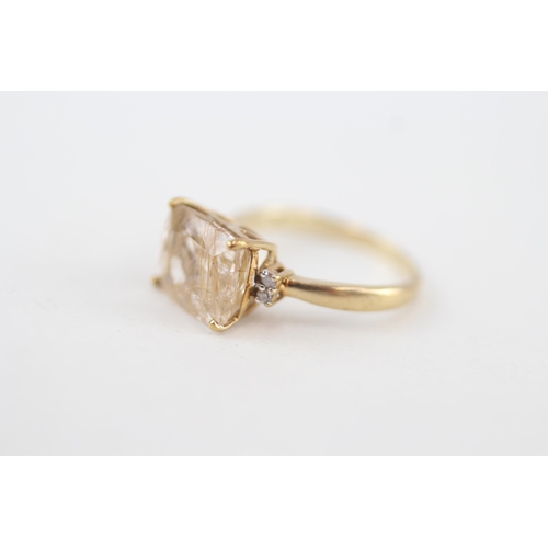 97 - 9ct gold rutilated quartz and diamond cocktail ring 2.9g   Size N 1/2