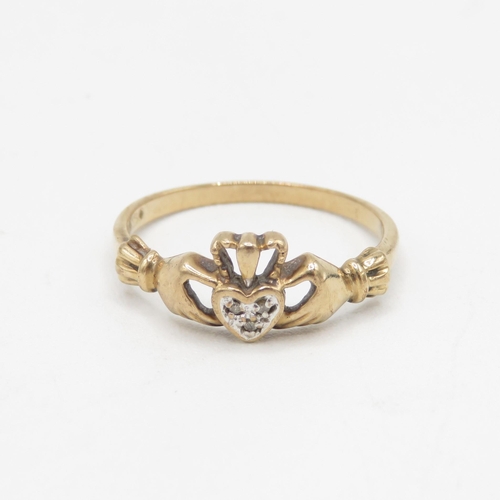 162 - 9ct gold diamond claddagh ring 1.8g Size P