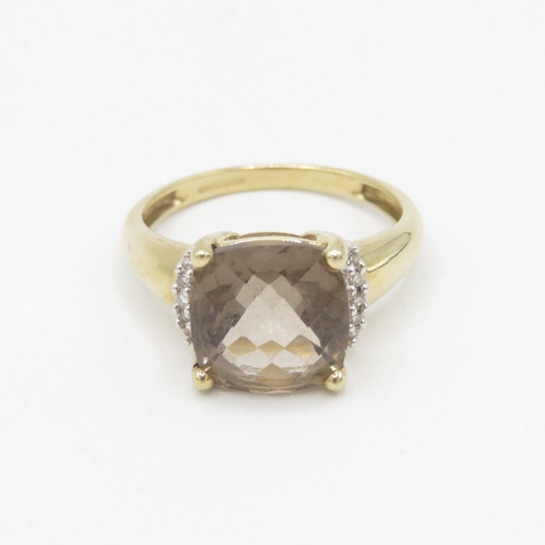 173 - 9ct gold checkerboard smoky quartz single stone ring with diamond sides 3.2g Size P