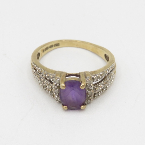 186 - 9ct gold amethyst single stone ring with diamond set split shank 2.6g Size L