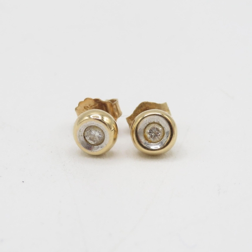 57 - 14ct gold diamond stud earrings with scroll backs 1.3g