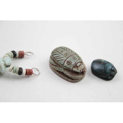 288 - A collection of Egyptian Revival beads including carved scarabs (15g)