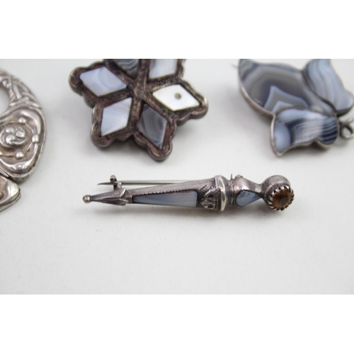 303 - Four silver Scottish brooches including Agate (34g)