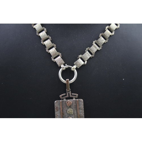 316 - Silver Victorian locket on bookchain with gold accents (43g)