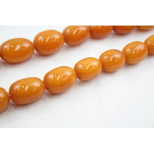 317 - Bakelite graduated necklace with screw clasp (clasp in need of repair) (48g)