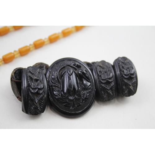 318 - Antique carved jet bracelet and Bakelite necklace (49g)