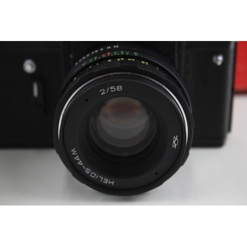 398 - SLR Vintage Film Cameras Inc Zenit EM & Zenit-E Working w/ Lenses x 2