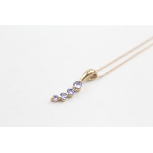 101 - 9ct gold tanzanite four stone pendant necklace (0.8g)